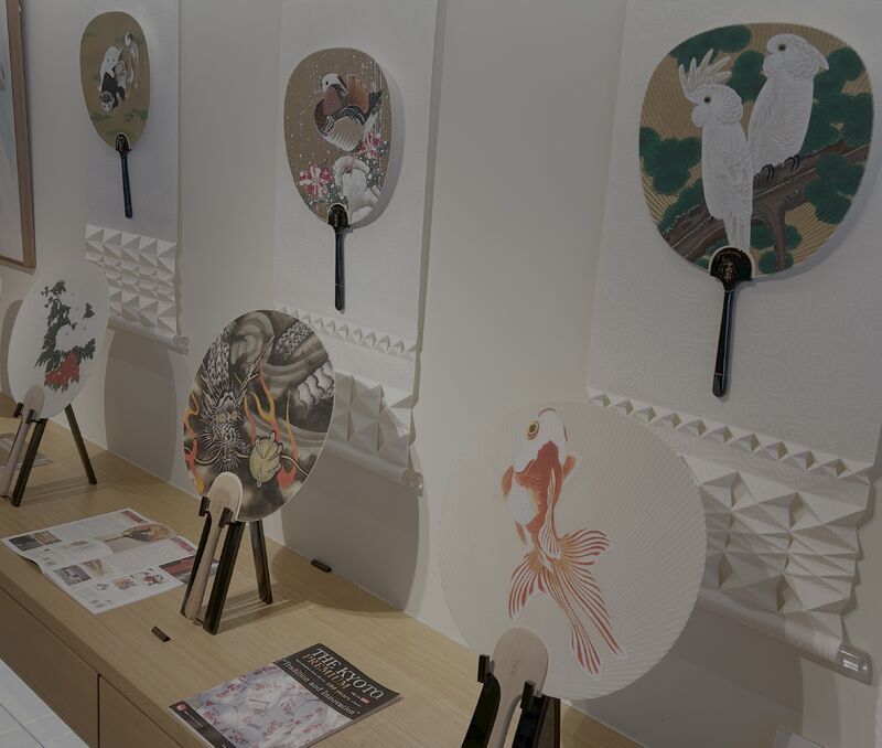 Traditional uchiwa fans and craft materials shown during the Pureosity visit.